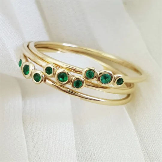 3 emerald ring gold