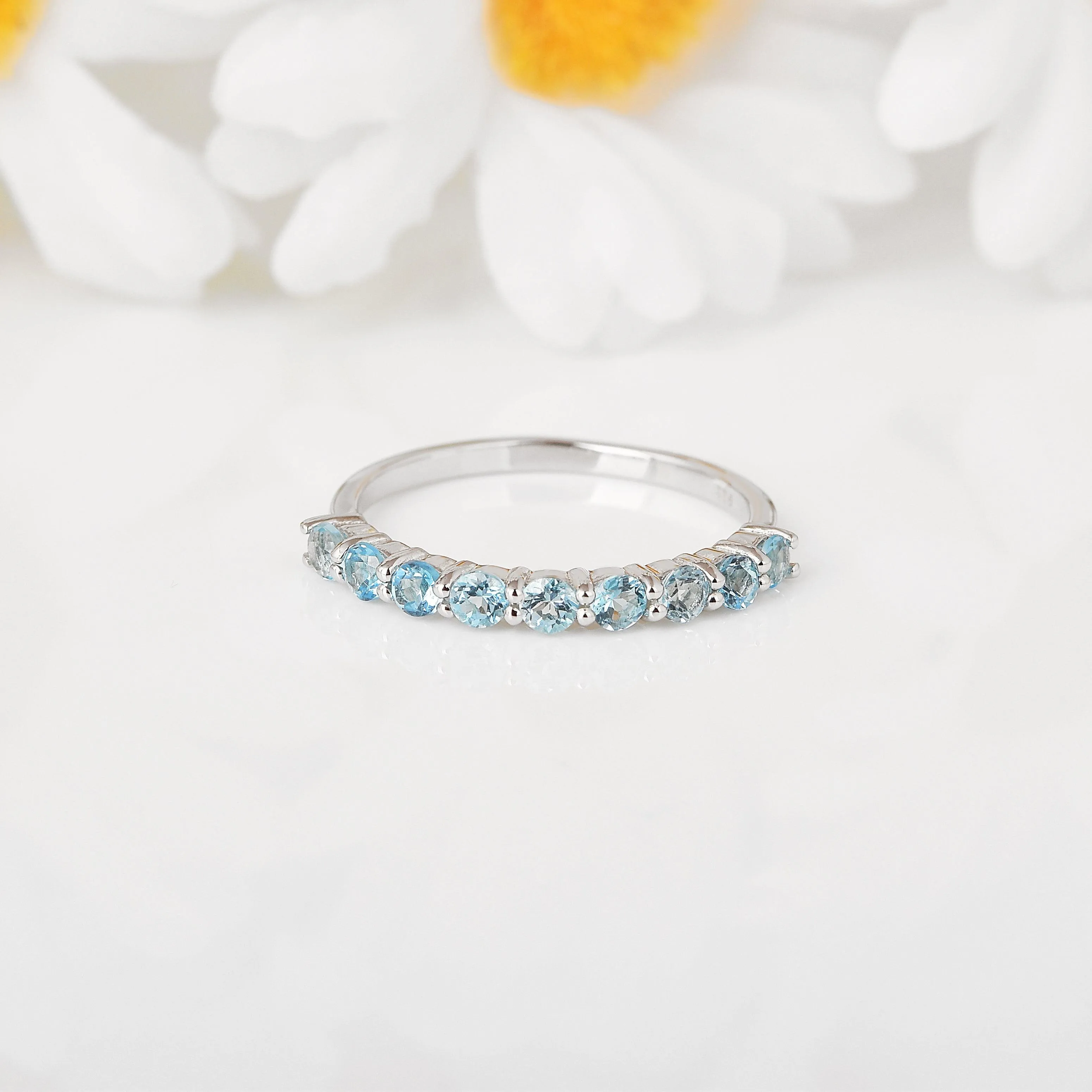 Blue Topaz Half Eternity Ring