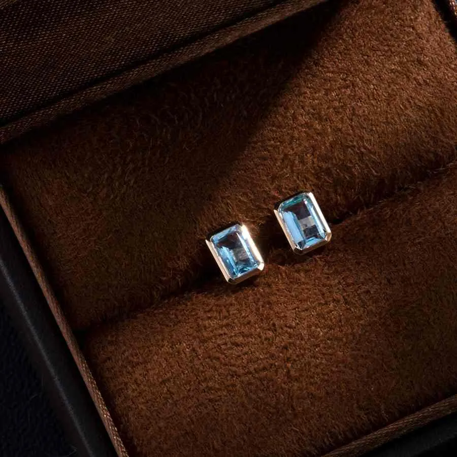 Blue Topaz Stud Earrings 18K Yellow Gold Emerald Cut