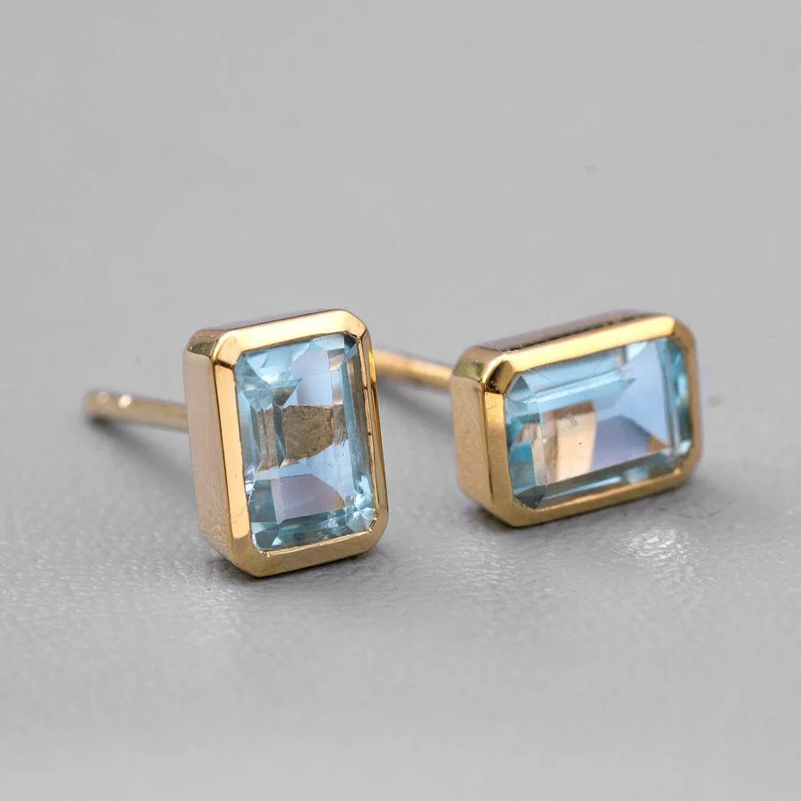 Blue Topaz Stud Earrings 18K Yellow Gold Emerald Cut