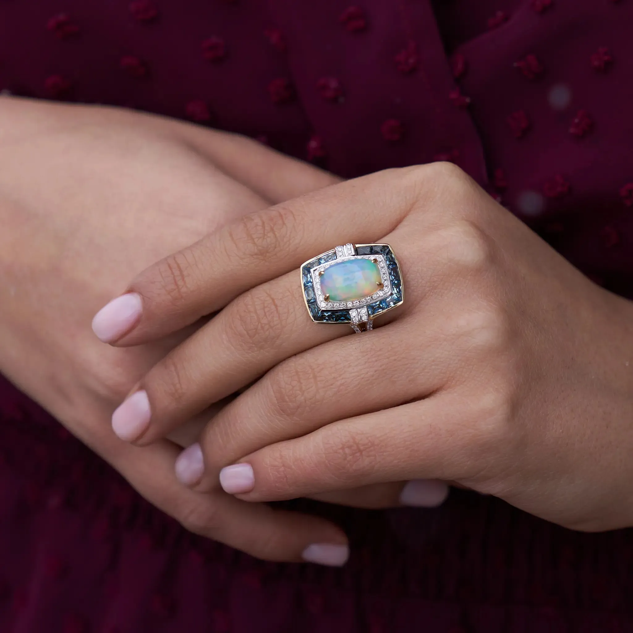 Oval Cabochon Opal Ring with Blue Topaz & Diamond Halo