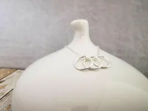 Sterling Silver Three Ring Story Necklace