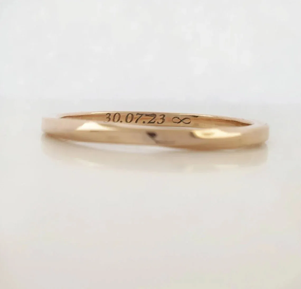 Tiny Mobius Ring With Engraved Date